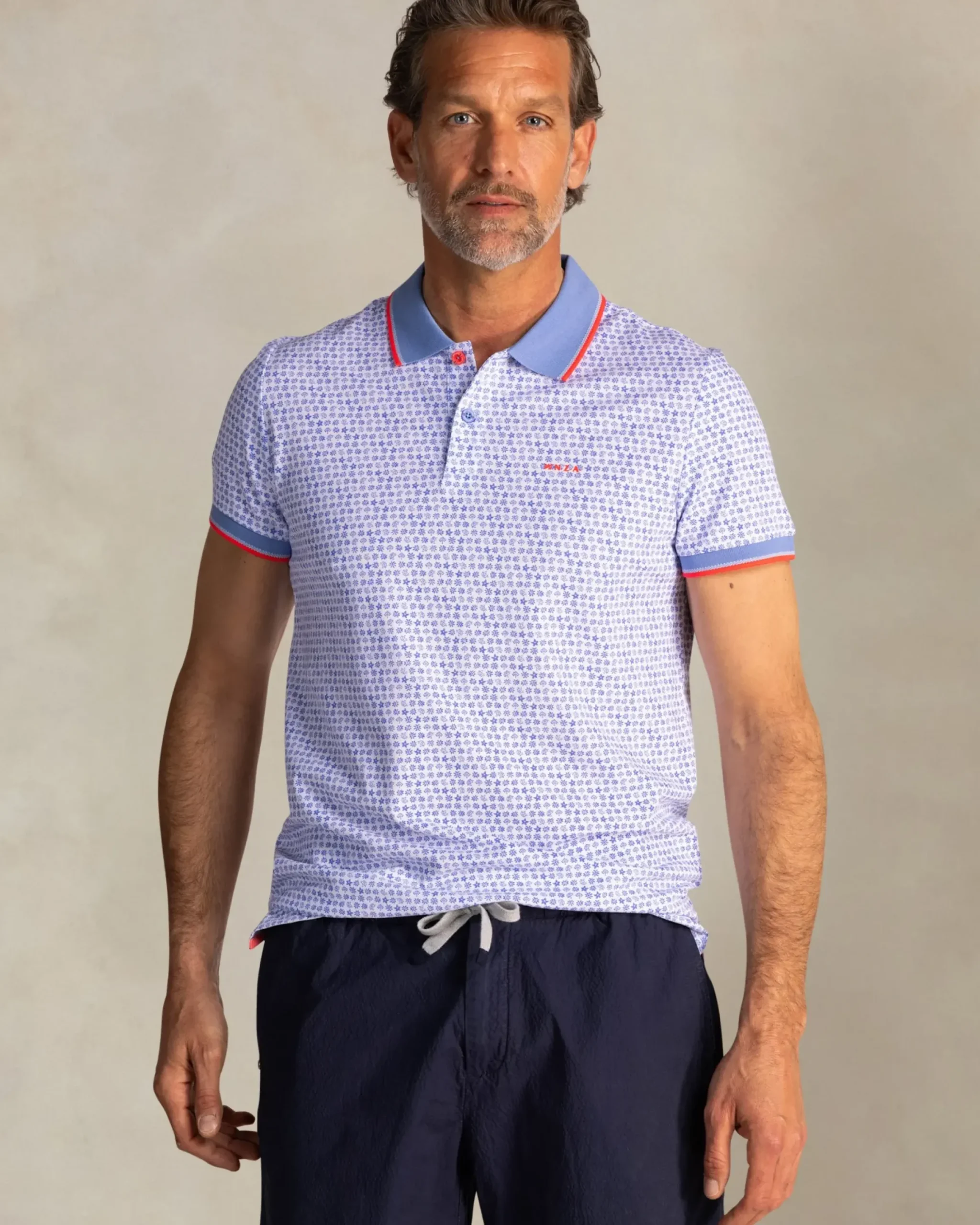 Blauwe katoenen polo met grafische print