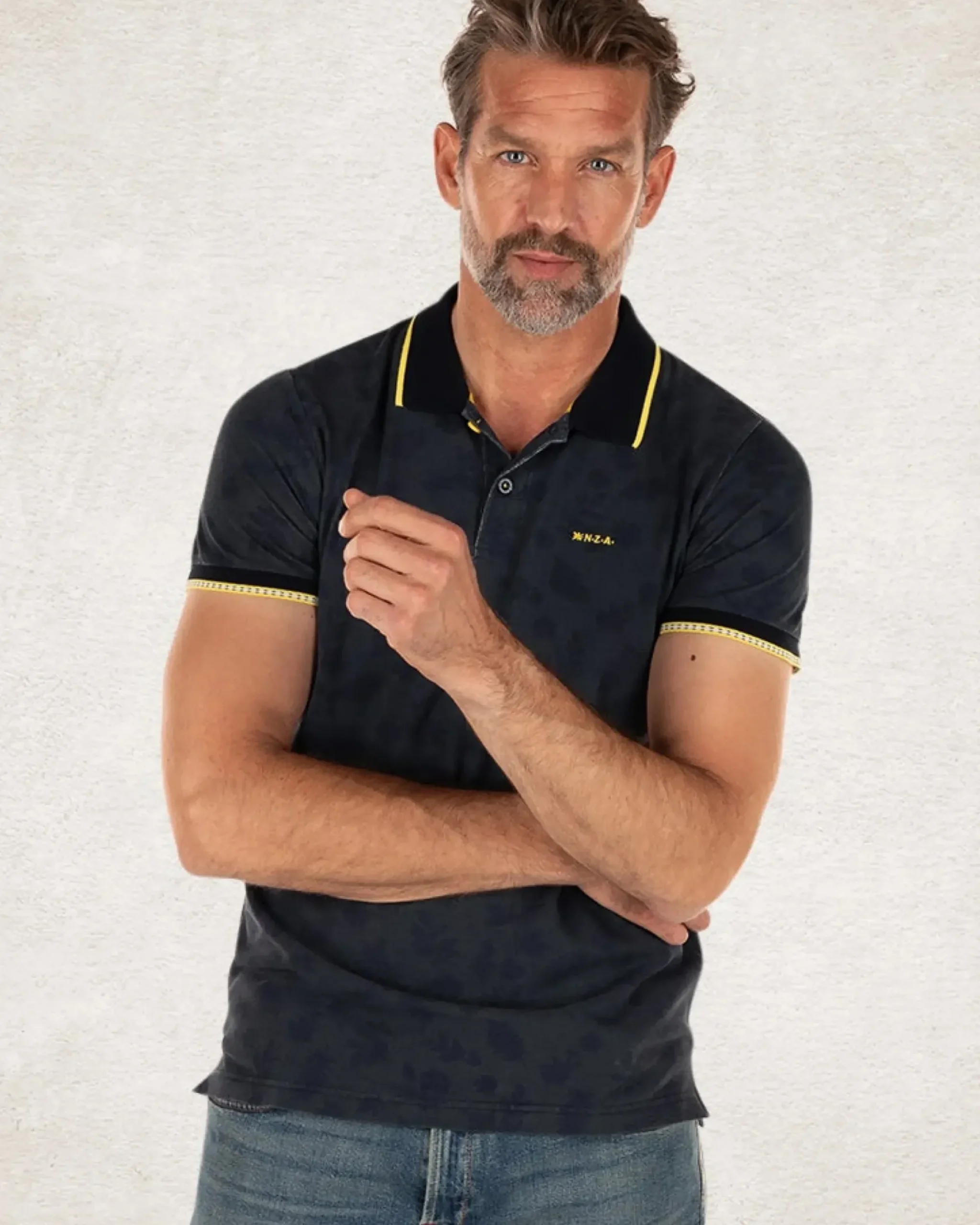 Donkerblauwe polo met bladprint