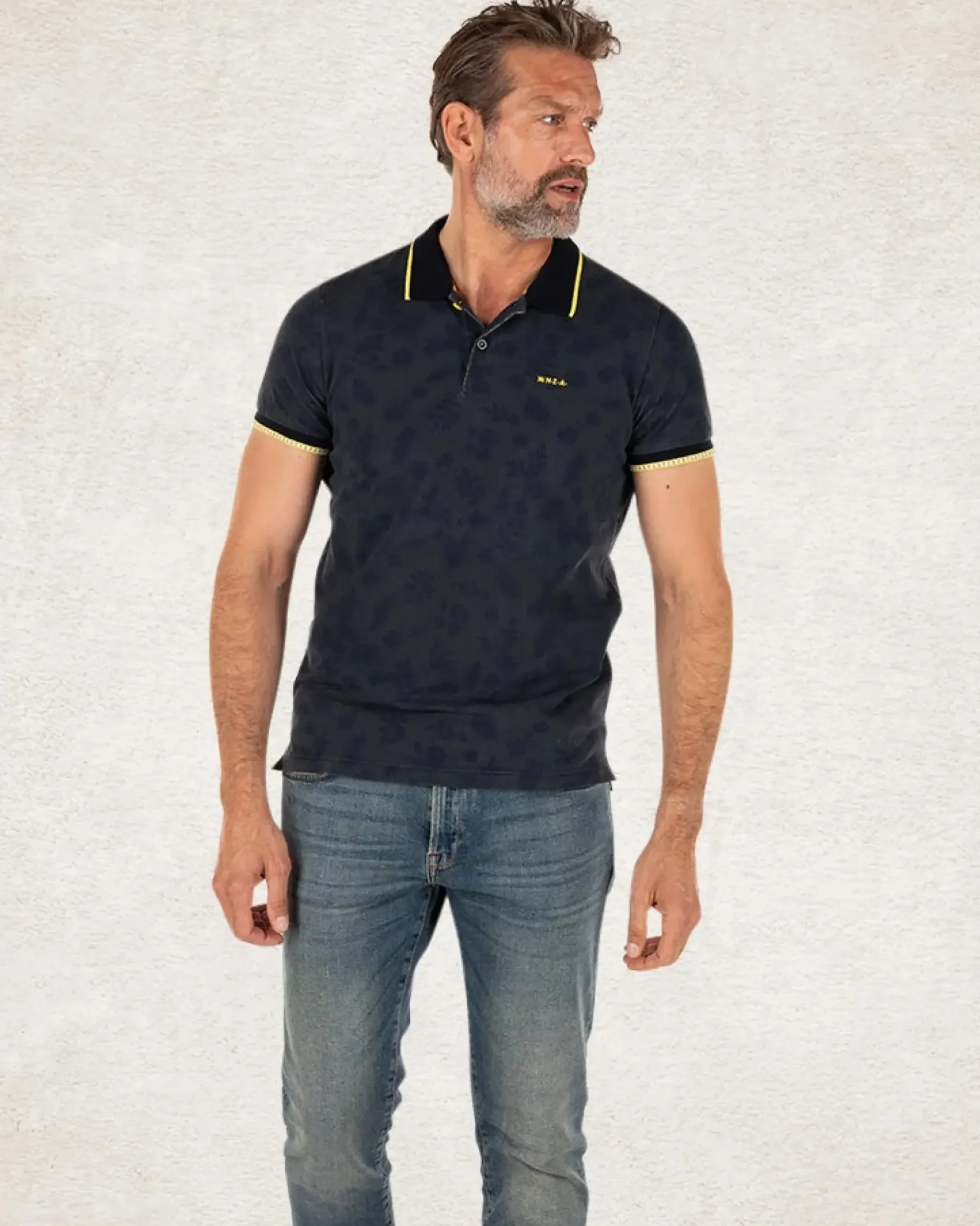 Donkerblauwe polo met bladprint