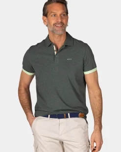 Donkergroene polo met lichtgroene details