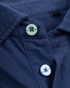 Effen katoenen blauwe polo