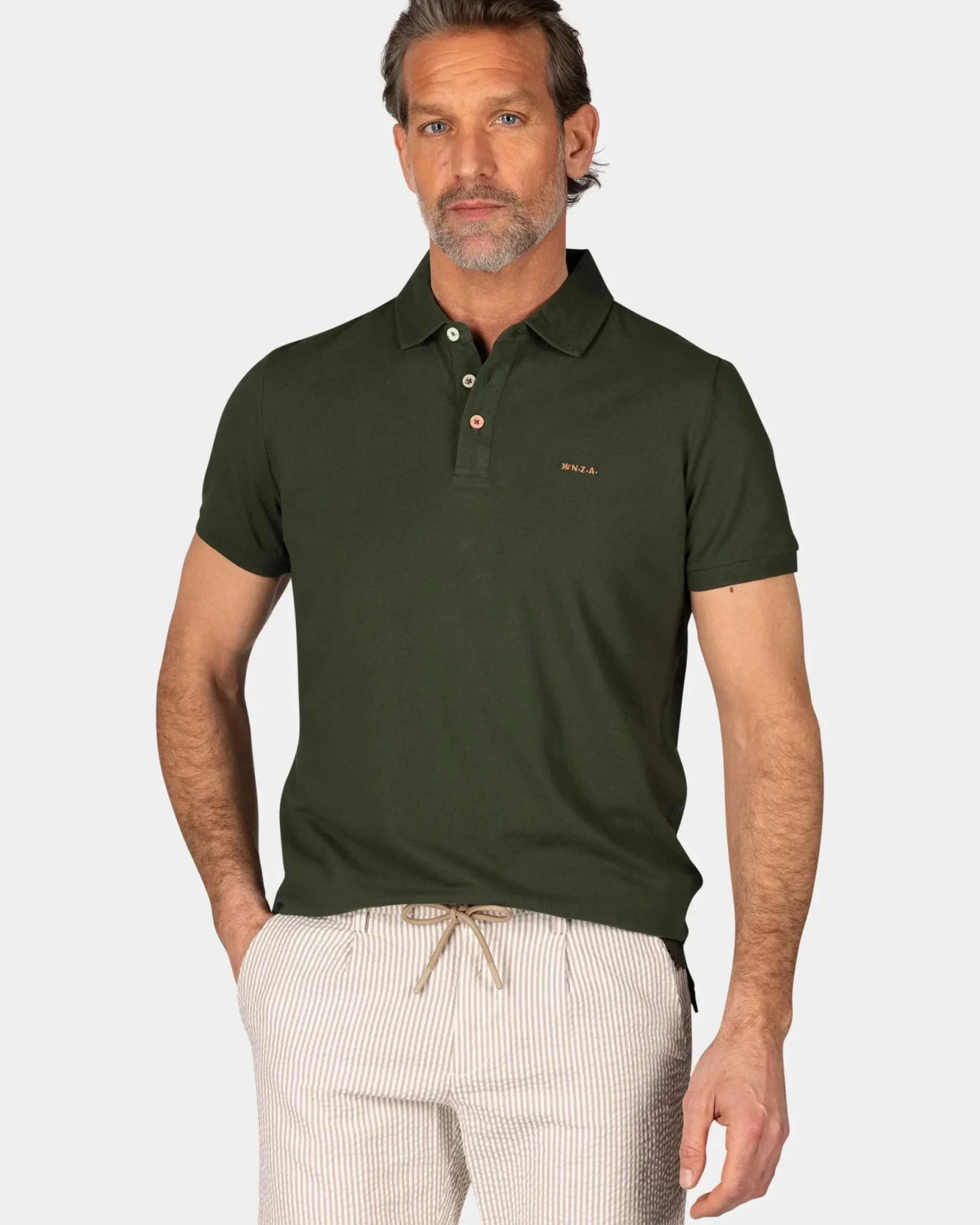 Effen katoenen donkergroene polo