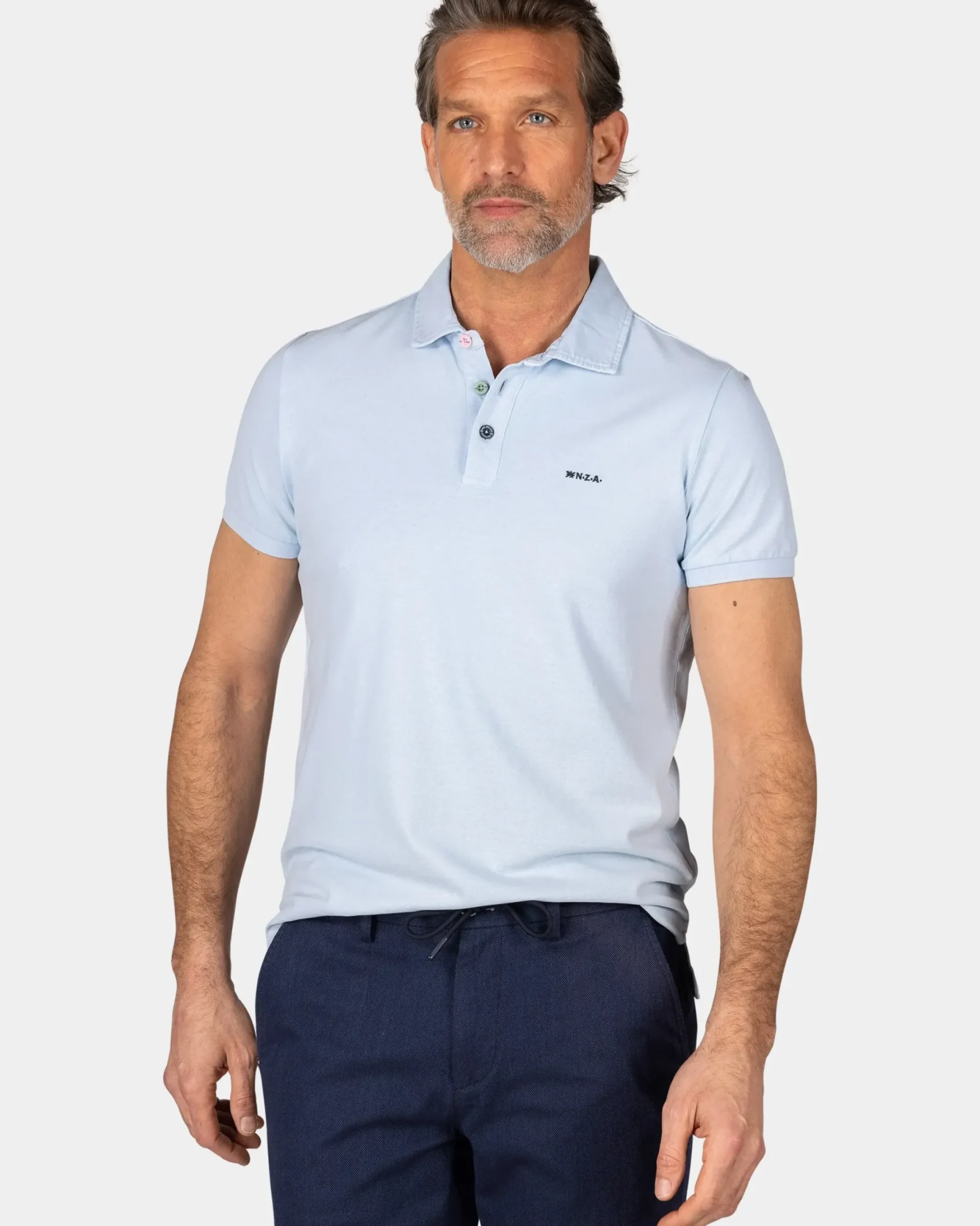 Effen katoenen pastelblauwe polo