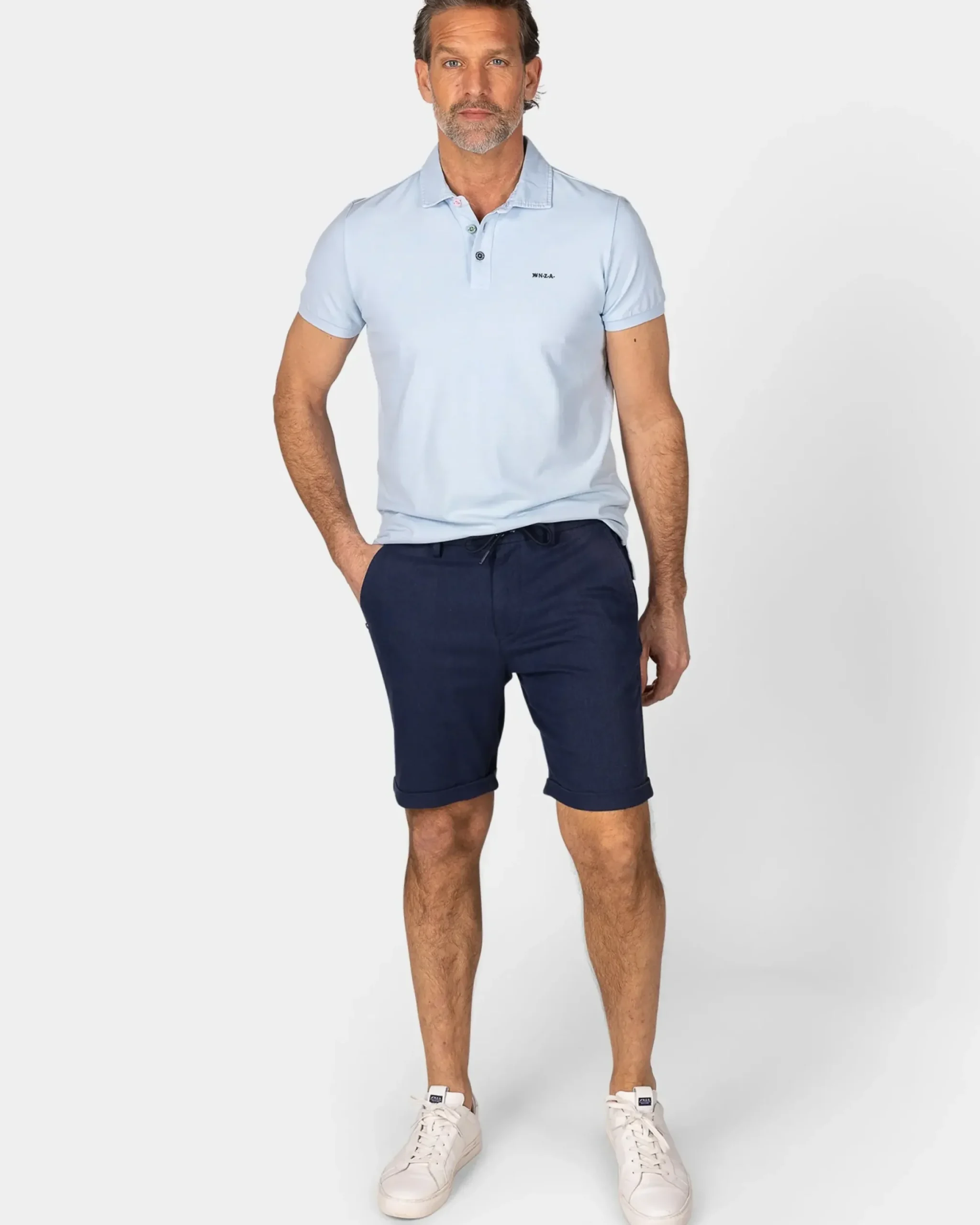 Effen katoenen pastelblauwe polo