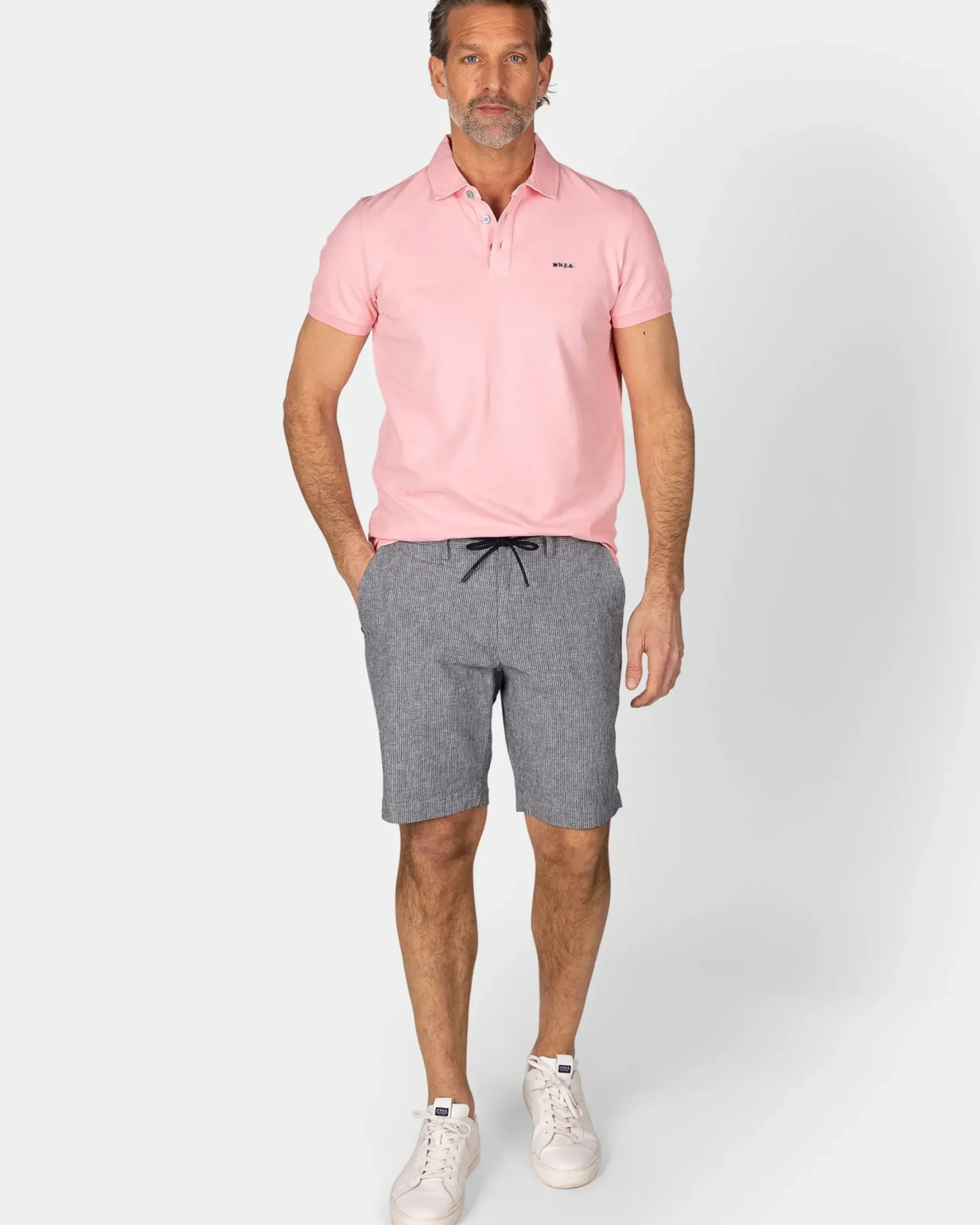 Effen katoenen pastelroze polo