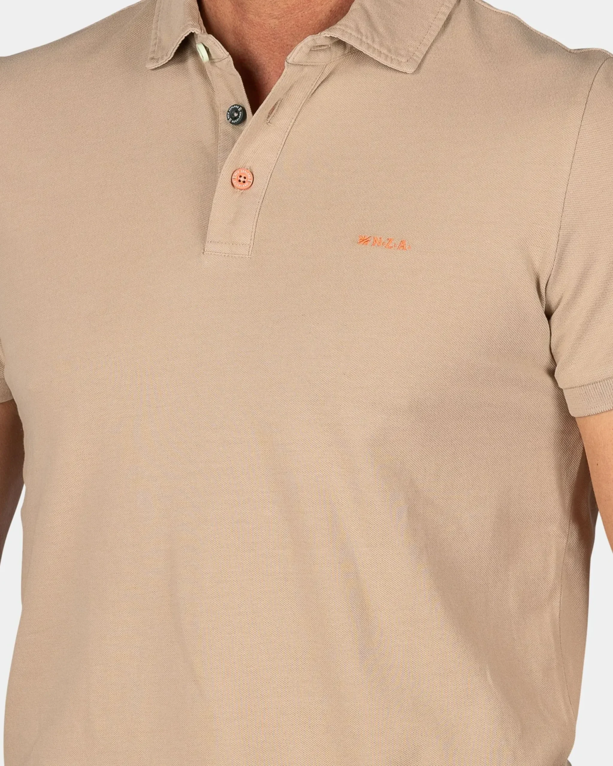 Effen katoenen zandkleurige polo