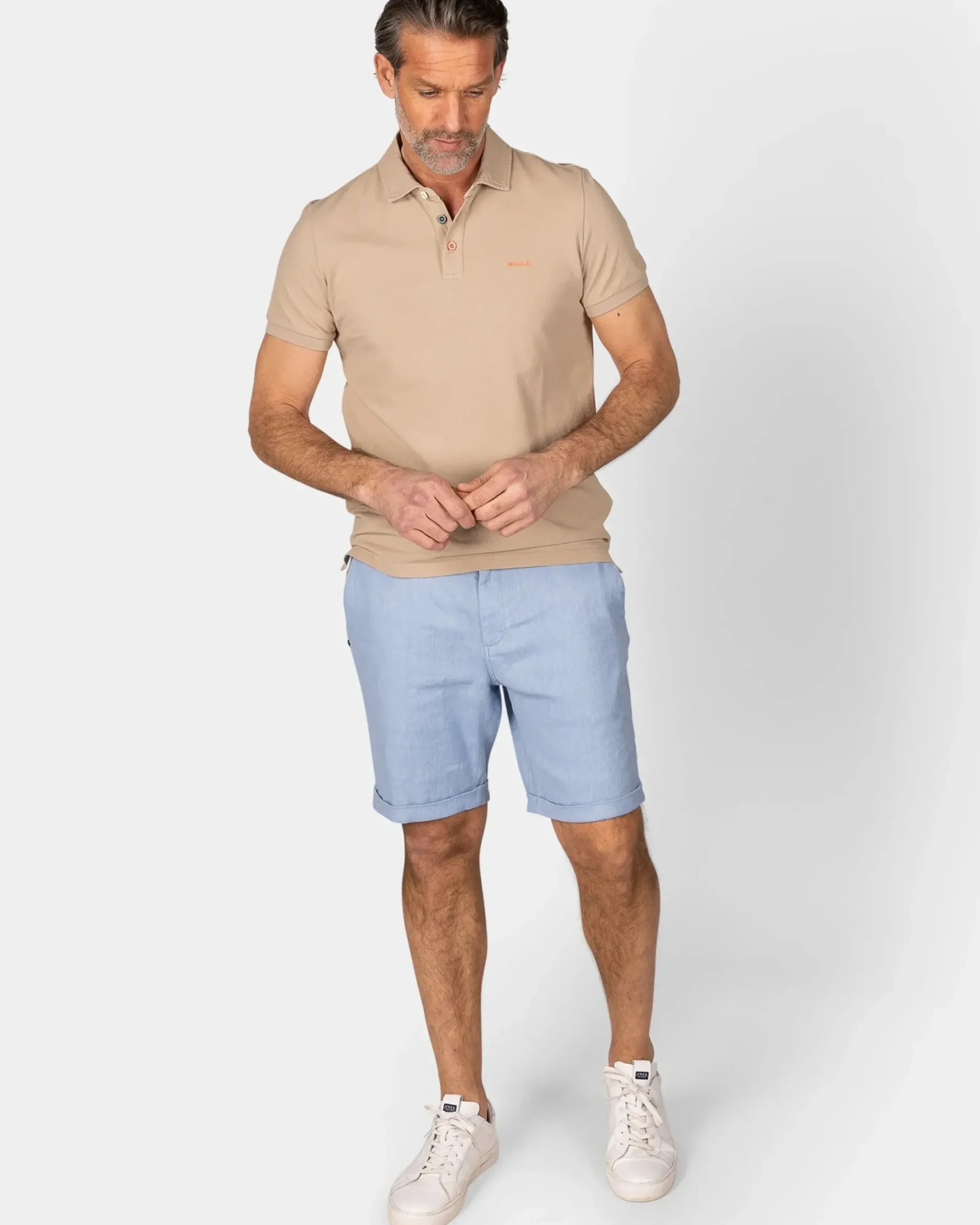 Effen katoenen zandkleurige polo