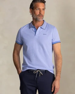 Felblauwe polo met gestreepte kraag
