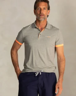 Groene polo met oranje details