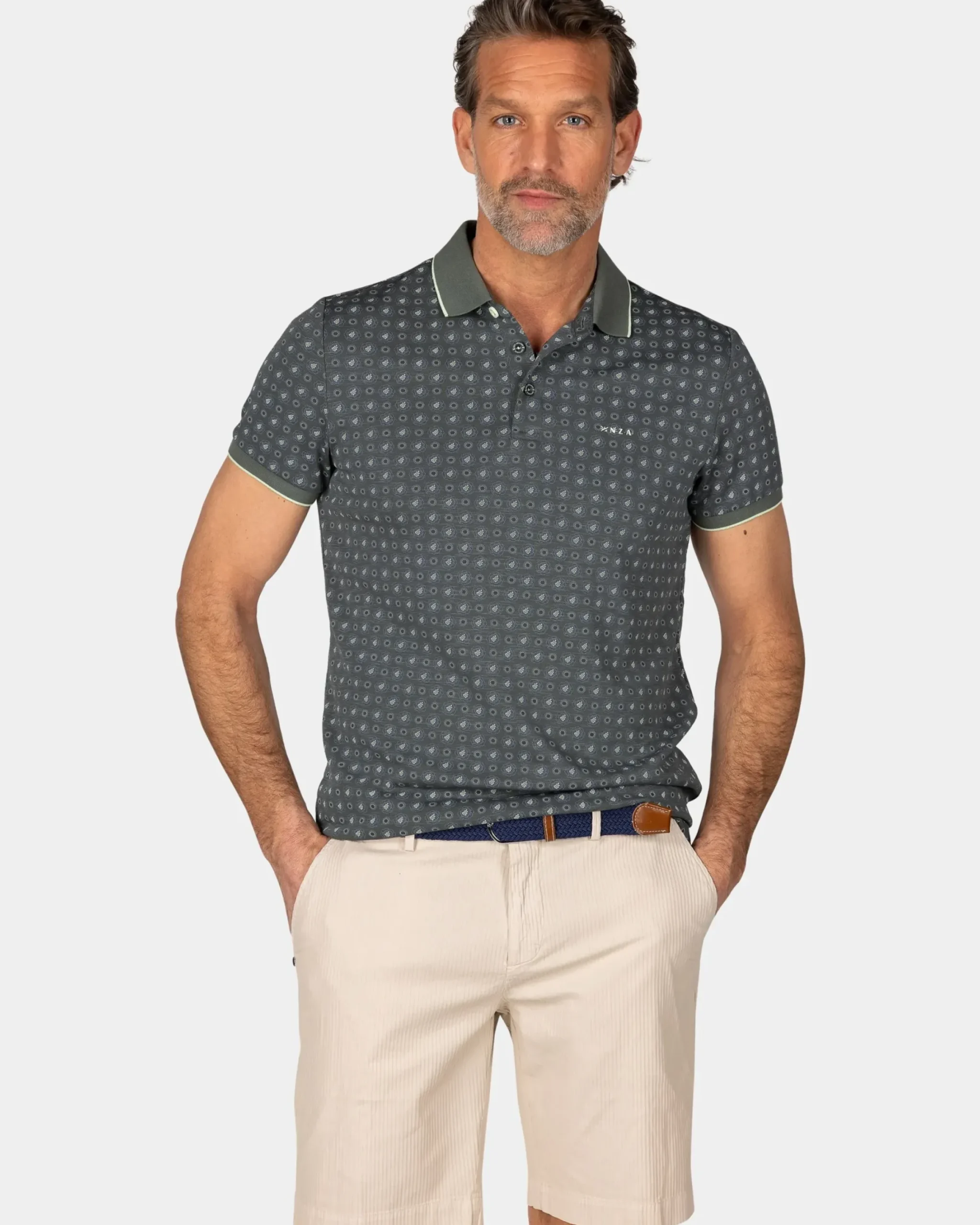 Groen poloshirt met kleine stippen