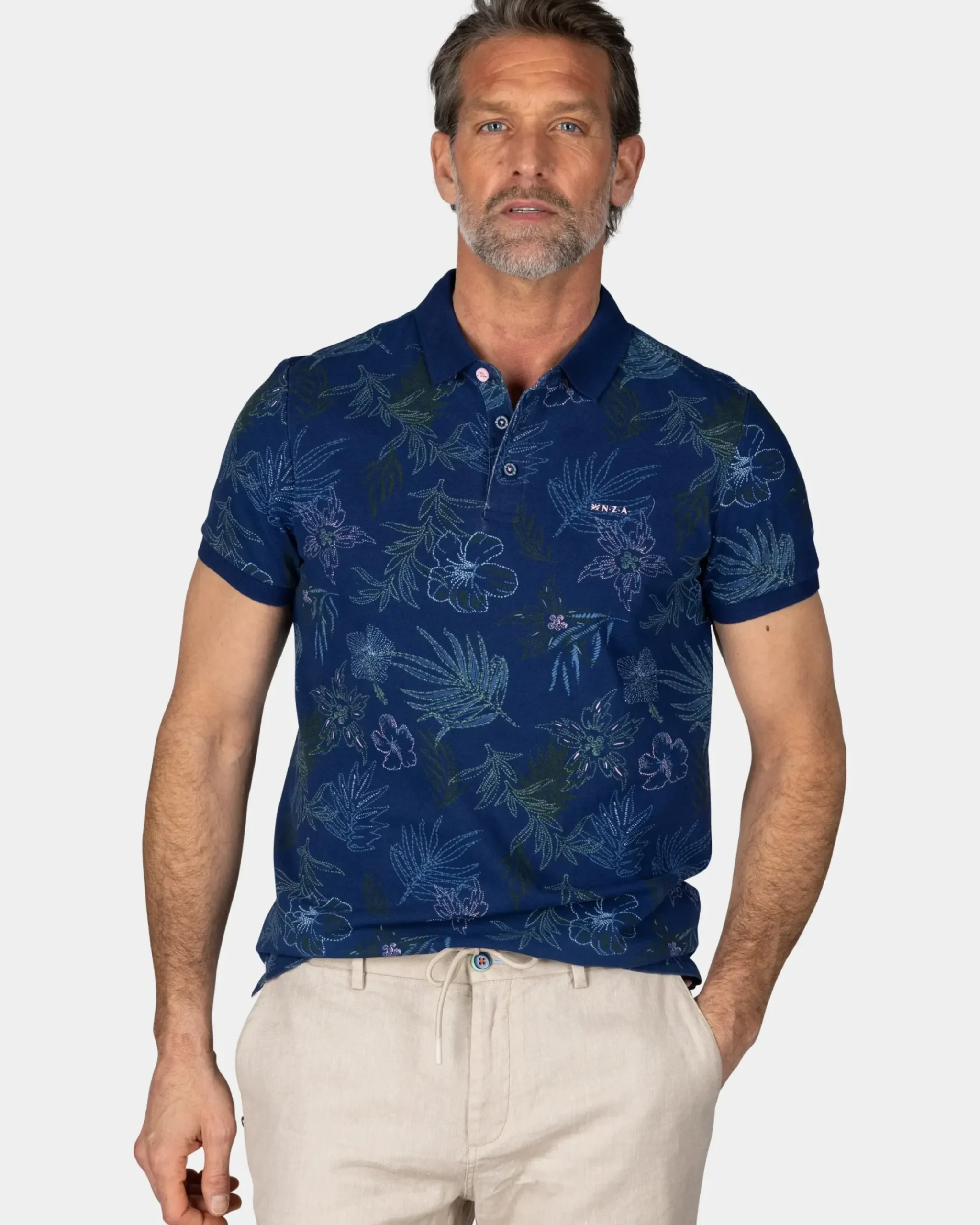 Katoenen navy polo met bladprint