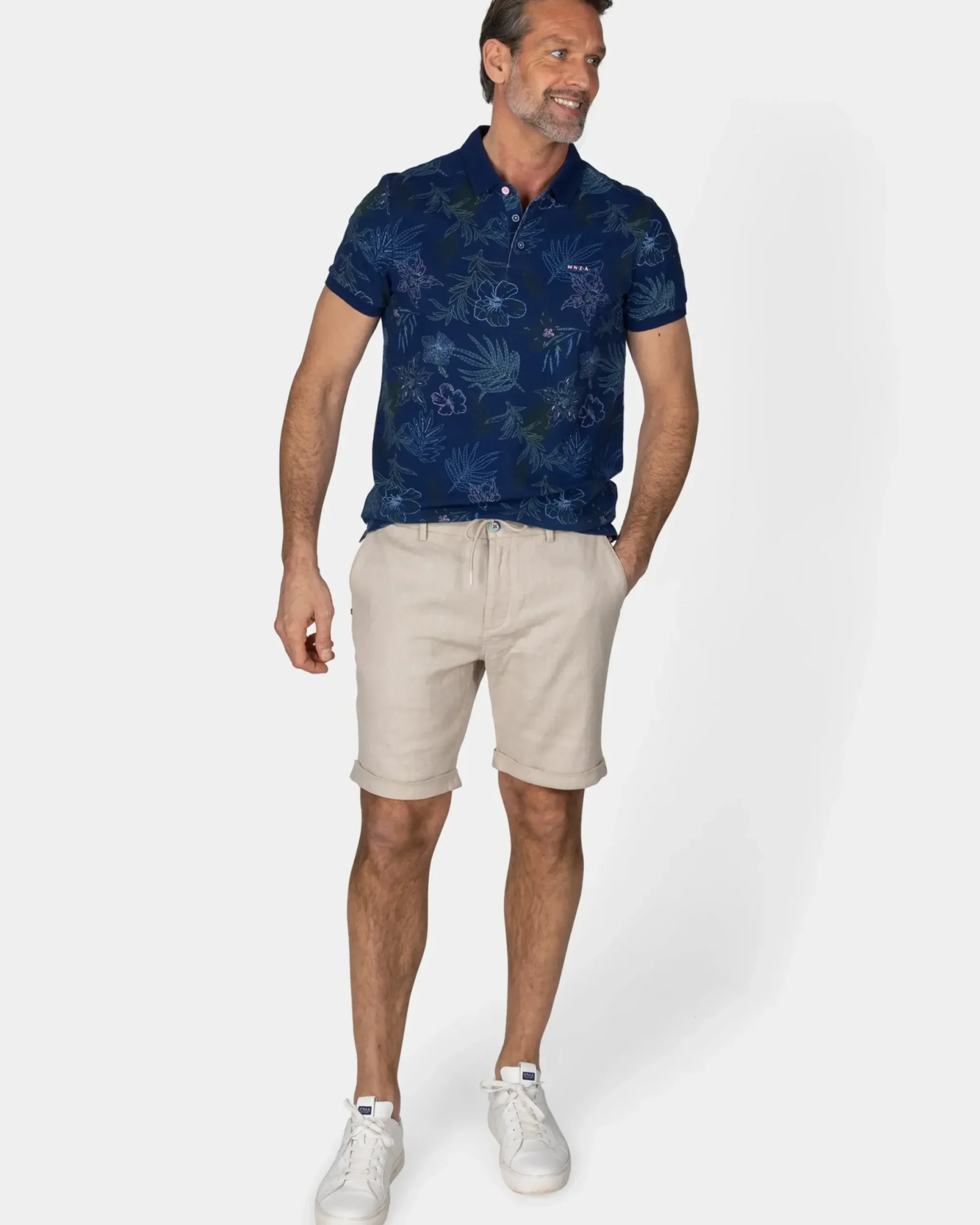 Katoenen navy polo met bladprint