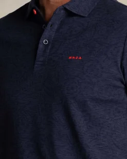 Navy polo met bladprint