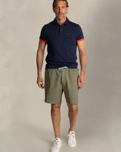 Navy polo met bladprint