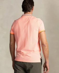 Oranje polo met gestreepte kraag