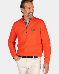 Oranje sweater met halve rits