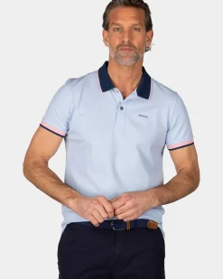 Pastelblauwe polo met blauwe kraag