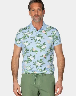 Pastelblauwe polo met grote bloemenprint