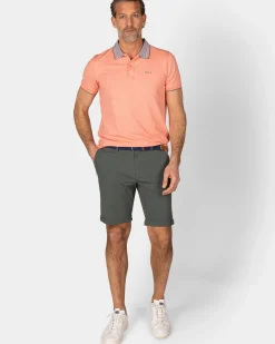 Pasteloranje polo met gestreepte kraag