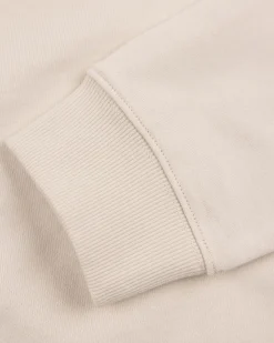 Witte trui met lichtblauwe strepen